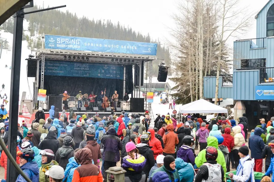 The stage at Winter Park with the crowd on the snow and the Wonderful sign